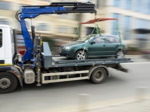 car being towed on a tow truck