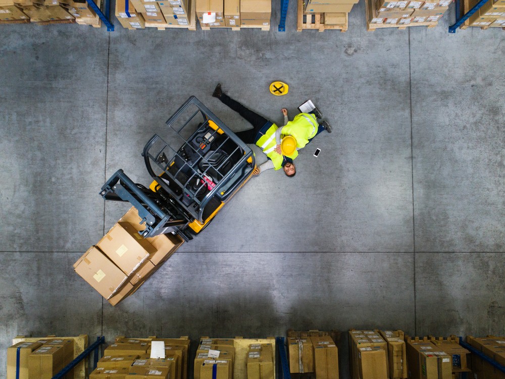 Warehouse workers after an accident in a warehouse